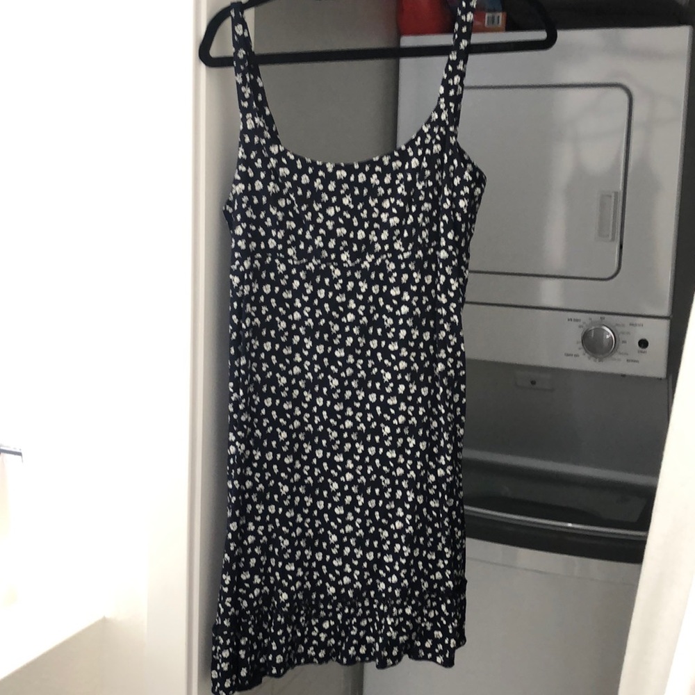 Never worn brandy Melville mini dress blue with white flowers.